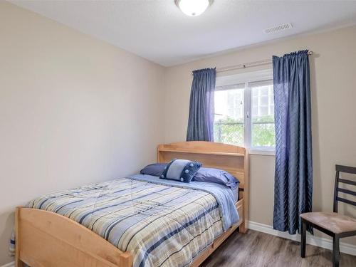 203 Biggar Road, Kelowna, BC - Indoor Photo Showing Bedroom