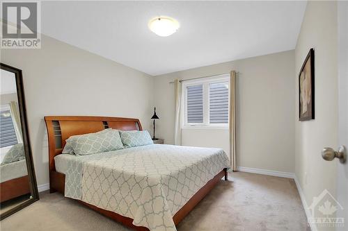 2nd bedroom with walk in closet - 915 Guinness Crescent, Ottawa, ON - Indoor Photo Showing Bedroom