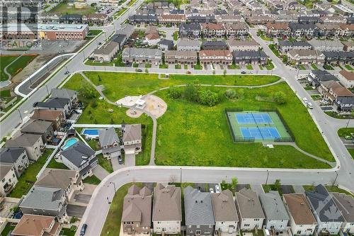 Park 1 minute walk away with tennis courts, play structures and open field - 915 Guinness Crescent, Ottawa, ON -  With View