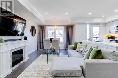 138 - 80 Parrotta Drive, Toronto, ON - Indoor Photo Showing Living Room With Fireplace