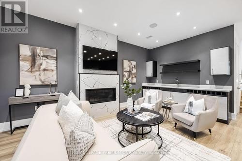 37 Twelfth Street, Toronto, ON - Indoor Photo Showing Living Room With Fireplace