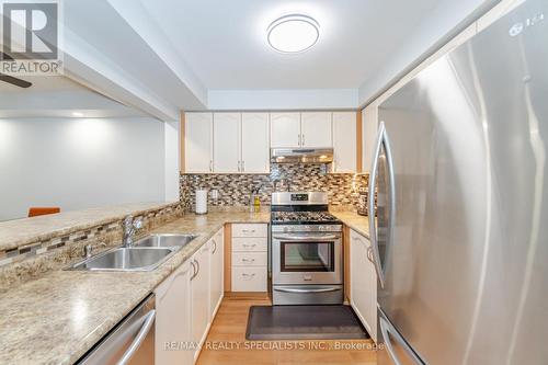 1 - 2350 Britannia Road W, Mississauga, ON - Indoor Photo Showing Kitchen With Stainless Steel Kitchen With Double Sink With Upgraded Kitchen