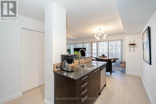 413 - 1040 The Queensway Avenue, Toronto, ON - Indoor Photo Showing Kitchen With Double Sink