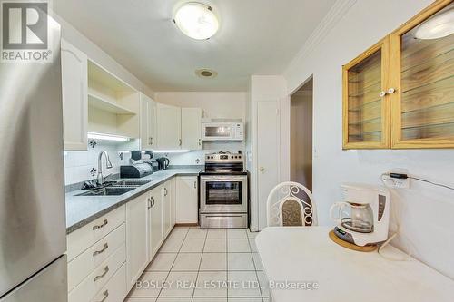 106 - 800 Kennedy Road, Toronto, ON - Indoor Photo Showing Kitchen With Double Sink