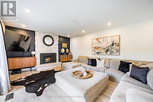 996 Oshawa Boulevard N, Oshawa, ON - Indoor Photo Showing Living Room With Fireplace