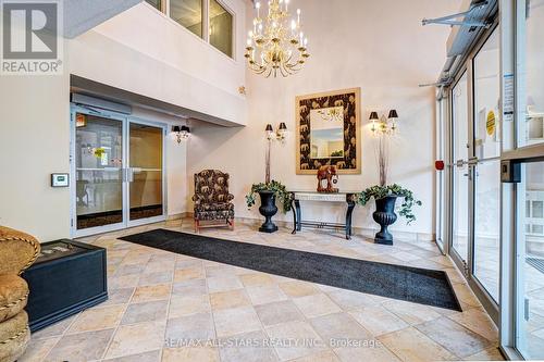 306 - 51 Rivermill Boulevard, Kawartha Lakes, ON - Indoor Photo Showing Living Room With Fireplace