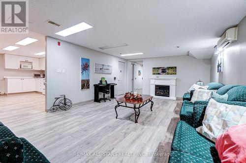 306 - 51 Rivermill Boulevard, Kawartha Lakes (Lindsay), ON - Indoor With Fireplace