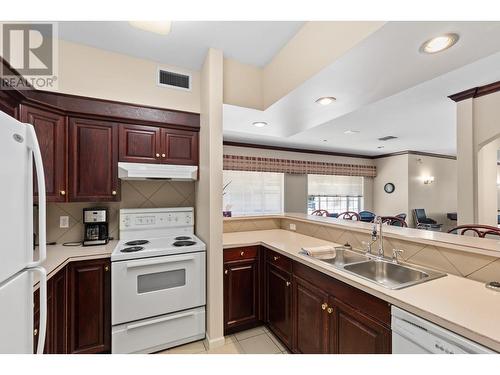 920 Glenwood Avenue Unit# 201, Kelowna, BC - Indoor Photo Showing Kitchen With Double Sink