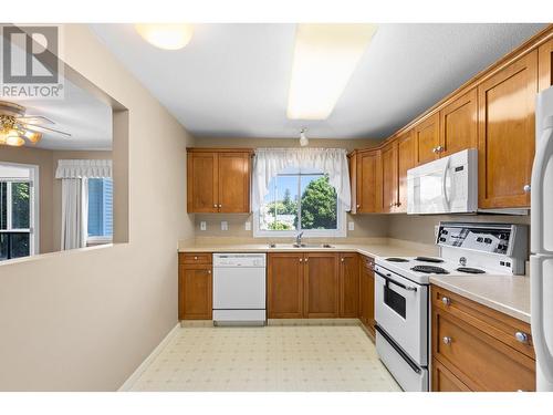 920 Glenwood Avenue Unit# 201, Kelowna, BC - Indoor Photo Showing Kitchen With Double Sink