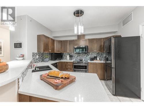 1128 Sunset Drive Unit# 1202, Kelowna, BC - Indoor Photo Showing Kitchen With Double Sink With Upgraded Kitchen