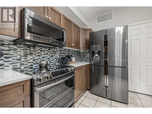 1128 Sunset Drive Unit# 1202, Kelowna, BC - Indoor Photo Showing Kitchen With Stainless Steel Kitchen With Upgraded Kitchen