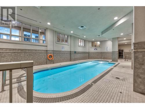 1128 Sunset Drive Unit# 1202, Kelowna, BC - Indoor Photo Showing Other Room With In Ground Pool