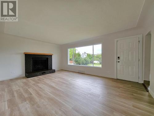 716 Alward Street, Prince George, BC - Indoor Photo Showing Living Room With Fireplace