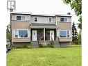 287-291 Mcintyre Crescent, Prince George, BC  - Outdoor With Deck Patio Veranda With Facade 