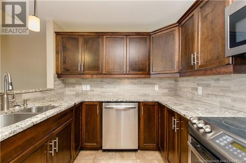 185 Royal Oaks Boulevard Unit# 110, Moncton, NB - Indoor Photo Showing Kitchen With Double Sink