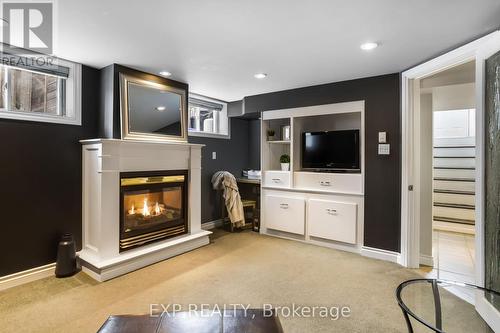 8 Warwick Road, Hamilton, ON - Indoor With Fireplace