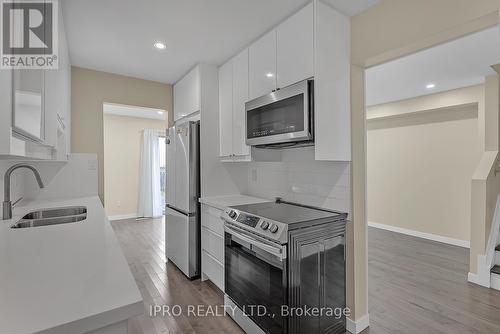 3424 Nighthawk Trail, Mississauga, ON - Indoor Photo Showing Kitchen With Double Sink With Upgraded Kitchen