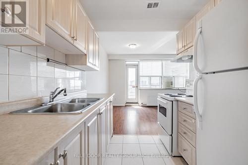 606 - 50 Gulliver Road, Toronto (Brookhaven-Amesbury), ON - Indoor Photo Showing Kitchen With Double Sink