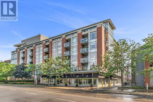 307 - 80 Port Street E, Mississauga, ON - Outdoor With Balcony With Facade