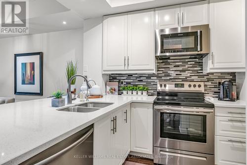 307 - 80 Port Street E, Mississauga, ON - Indoor Photo Showing Kitchen With Double Sink With Upgraded Kitchen