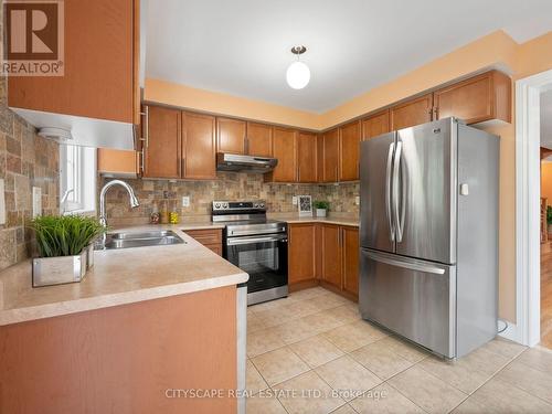 27 Spicebush Terrace, Brampton, ON - Indoor Photo Showing Kitchen With Double Sink