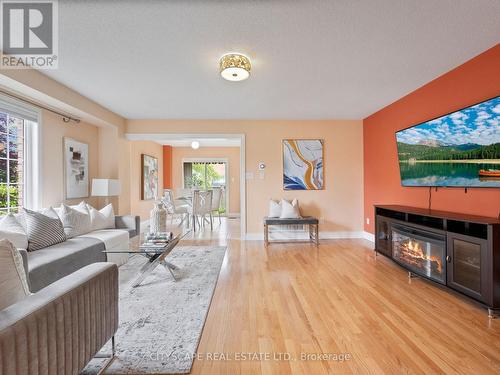 27 Spicebush Terrace, Brampton, ON - Indoor Photo Showing Living Room With Fireplace