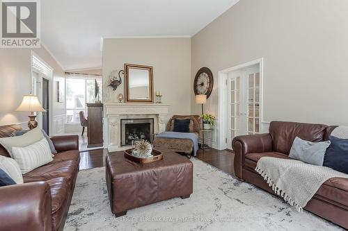 675 North Shore Boulevard E, Burlington, ON - Indoor Photo Showing Living Room With Fireplace