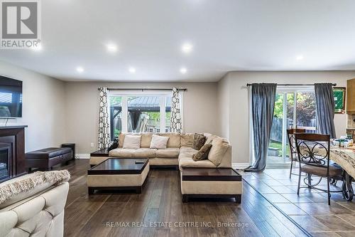 59 Kidd Crescent, New Tecumseth, ON - Indoor Photo Showing Living Room With Fireplace