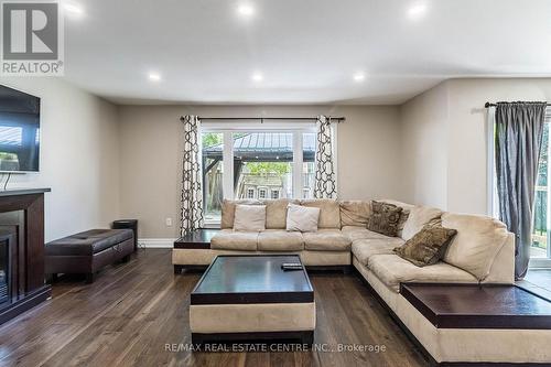 59 Kidd Crescent, New Tecumseth, ON - Indoor Photo Showing Living Room With Fireplace