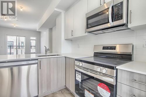98 Bartley Drive, Toronto, ON - Indoor Photo Showing Kitchen With Double Sink With Upgraded Kitchen