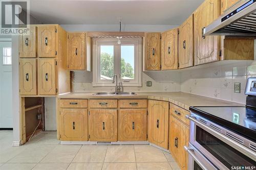 26 Hawkes Avenue, Regina, SK - Indoor Photo Showing Kitchen With Double Sink