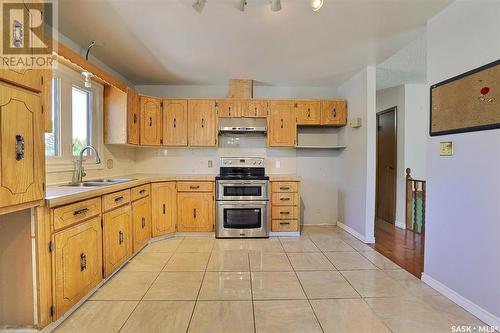 26 Hawkes Avenue, Regina, SK - Indoor Photo Showing Kitchen With Double Sink