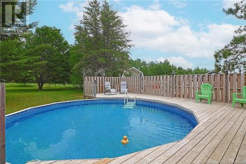 16 Hazelton Road, Doaktown, NB - Outdoor With Above Ground Pool With Deck Patio Veranda With Backyard