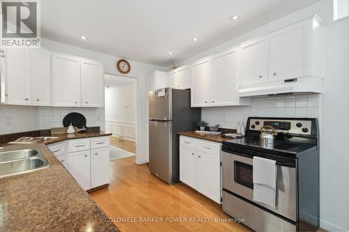 35 - 50 Fiddlers Green Road, London, ON - Indoor Photo Showing Kitchen With Double Sink