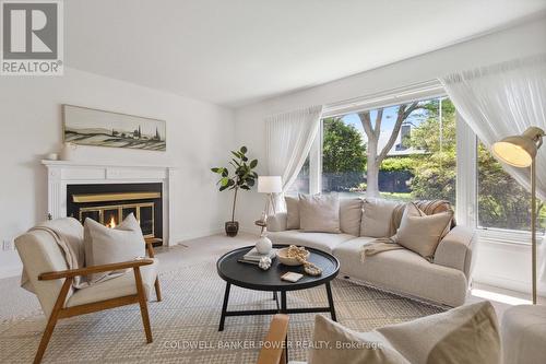 35 - 50 Fiddlers Green Road, London, ON - Indoor Photo Showing Living Room With Fireplace