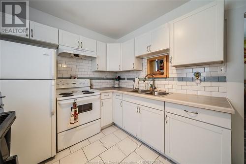 1390 Howard Avenue, Windsor, ON - Indoor Photo Showing Kitchen With Double Sink