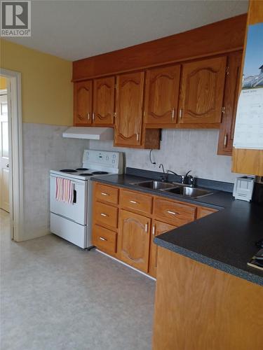 57 Main Street, Fogo Island (Deep Bay), NL - Indoor Photo Showing Kitchen With Double Sink