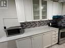 2306 - 340 Dixon Road, Toronto, ON  - Indoor Photo Showing Kitchen 