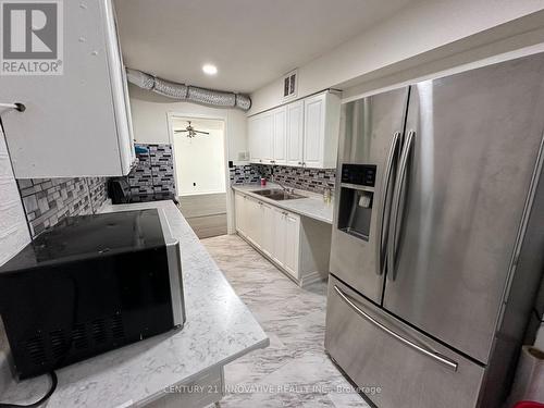 2306 - 340 Dixon Road, Toronto, ON - Indoor Photo Showing Kitchen With Double Sink