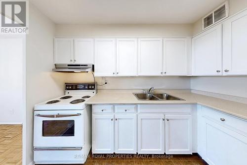 702 - 20 Forest Manor Road, Toronto (Henry Farm), ON - Indoor Photo Showing Kitchen With Double Sink