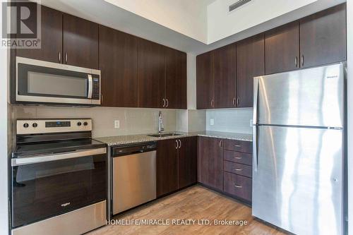 413 - 3220 Sheppard Avenue E, Toronto, ON - Indoor Photo Showing Kitchen With Stainless Steel Kitchen With Upgraded Kitchen