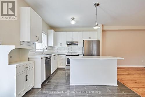 1202 Peelar Crescent, Innisfil, ON - Indoor Photo Showing Kitchen With Upgraded Kitchen