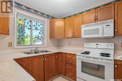 234 Ward Court, Saskatoon, SK - Indoor Photo Showing Kitchen With Double Sink