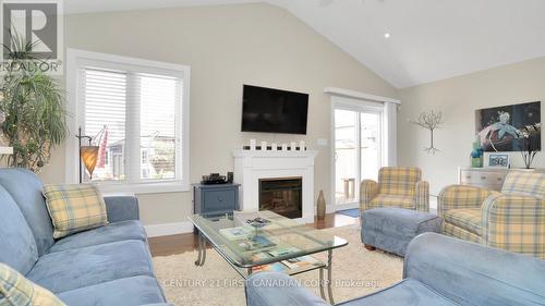 1863 Reilly Walk, London, ON - Indoor Photo Showing Living Room With Fireplace