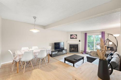 5216 173 Victor Lewis Drive, Winnipeg, MB - Indoor With Fireplace