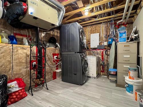 28 Pine Ridge Crescent, Brandon, MB - Indoor Photo Showing Basement