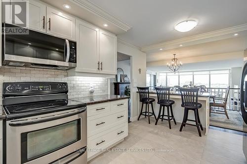 1205 - 2180 Marine Drive, Oakville, ON - Indoor Photo Showing Kitchen