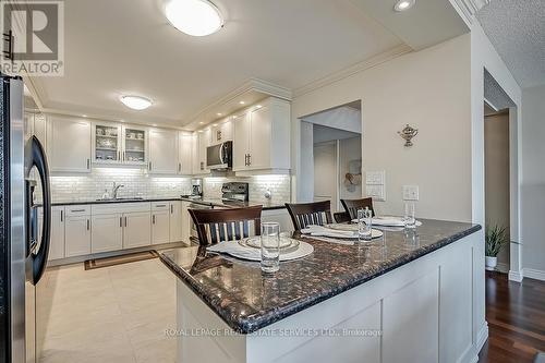 1205 - 2180 Marine Drive, Oakville, ON - Indoor Photo Showing Kitchen With Upgraded Kitchen