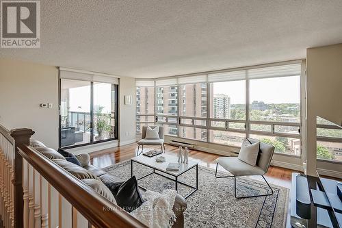 1205 - 2180 Marine Drive, Oakville, ON - Indoor Photo Showing Living Room