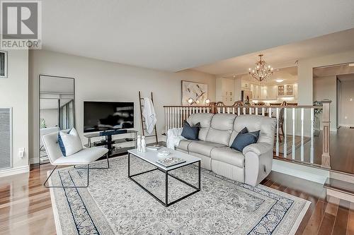 1205 - 2180 Marine Drive, Oakville, ON - Indoor Photo Showing Living Room